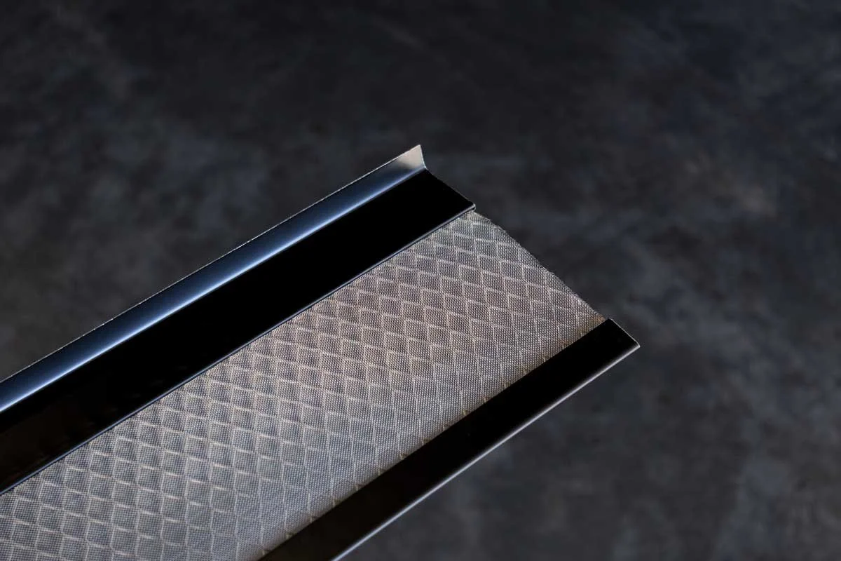 Close-up of seamless gutter and gutter guard installation