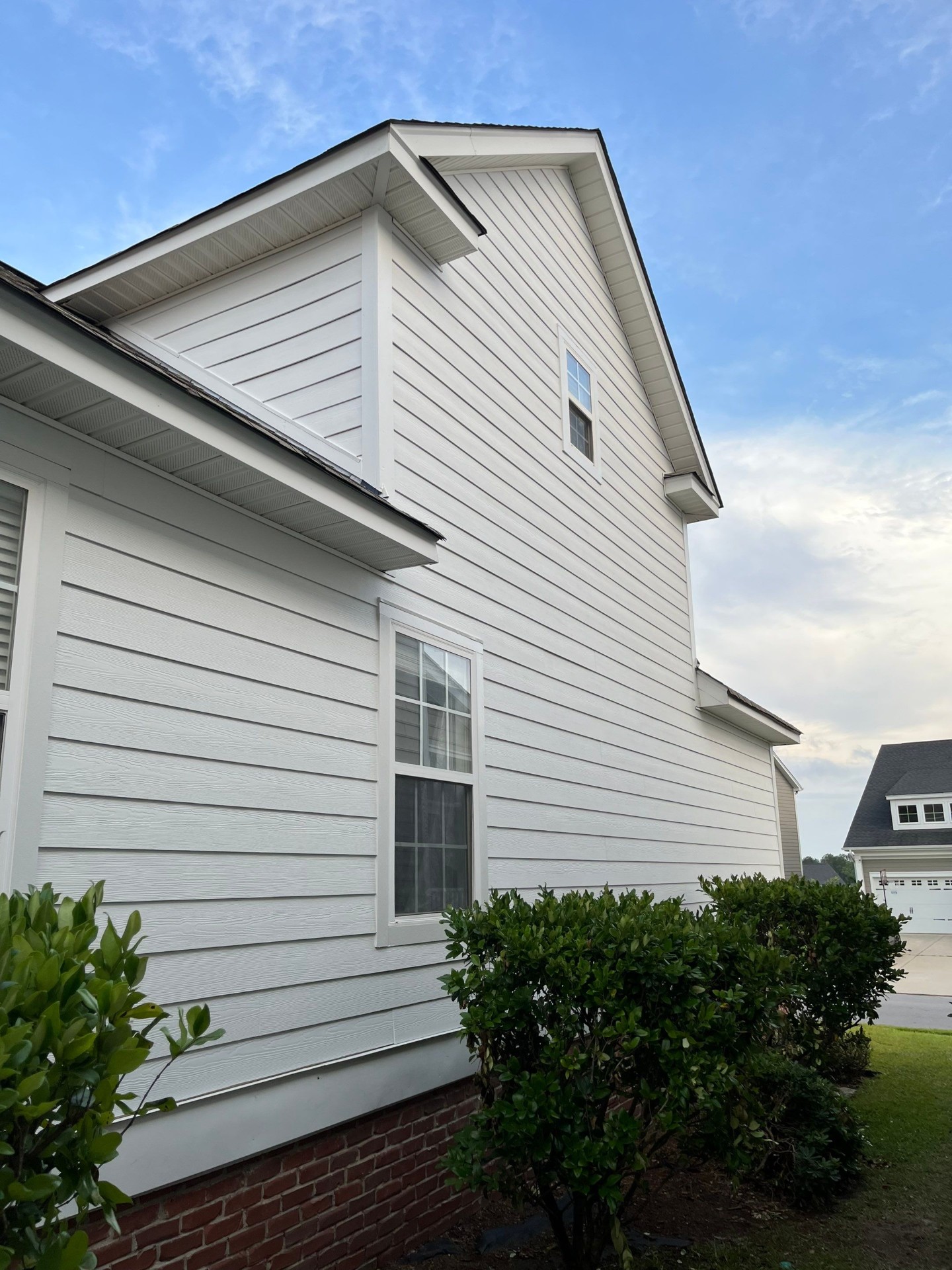 Gray siding installation with clean trim detail