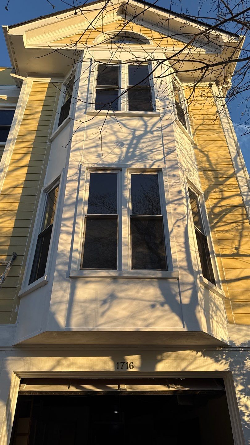 Fiber cement siding with stone accent on a Midlands home